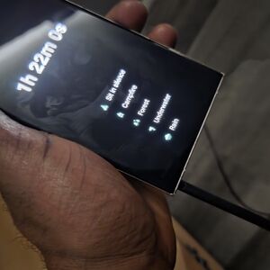 Black Smartphone with Charging Cable